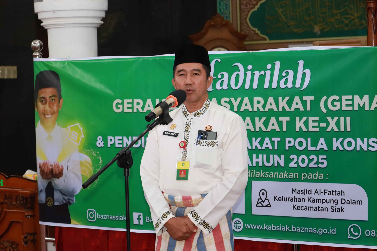 FAUZI ASNI  HIMBAU  DAN AJAK  MASYAKAT DI 3 TPS YANG DI PSU PILKADA SIAK UNTUK MEMBERIKAN HAK PILIHANYA DI TANGGAL 22 MARET 2025