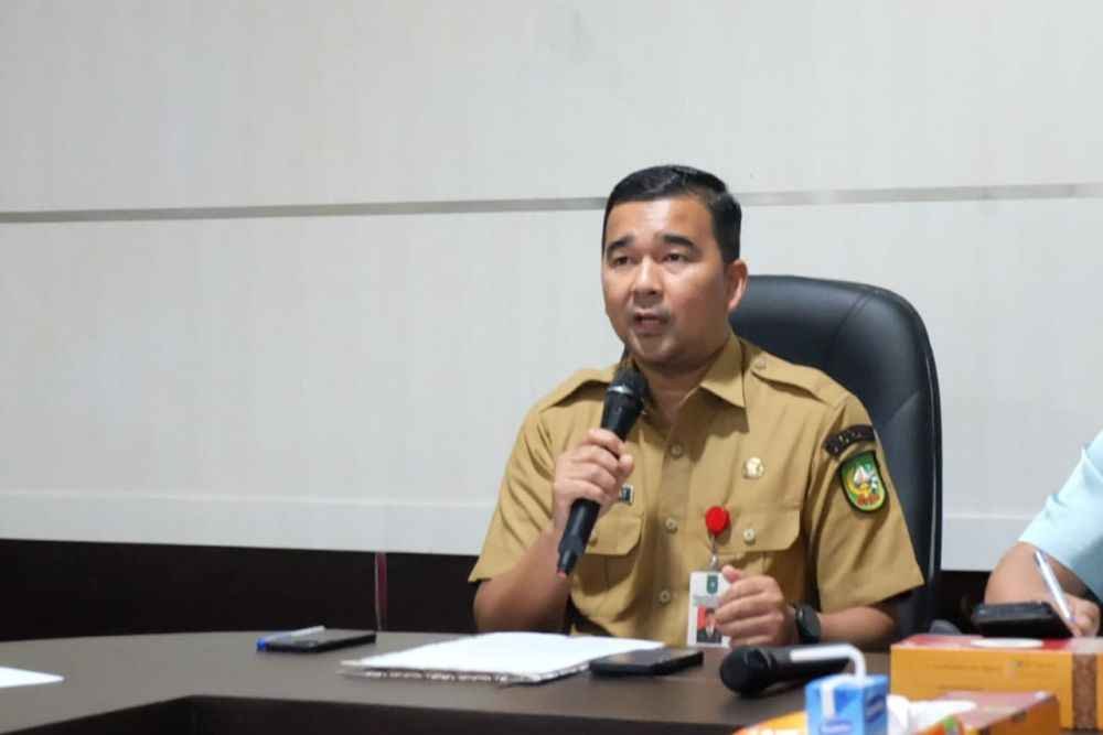 PJ GUBERNUR  TEKEN SK PENETAPAN UMK dan UMSK Provinsi Riau